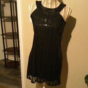 5/$25.    Black sequin dress